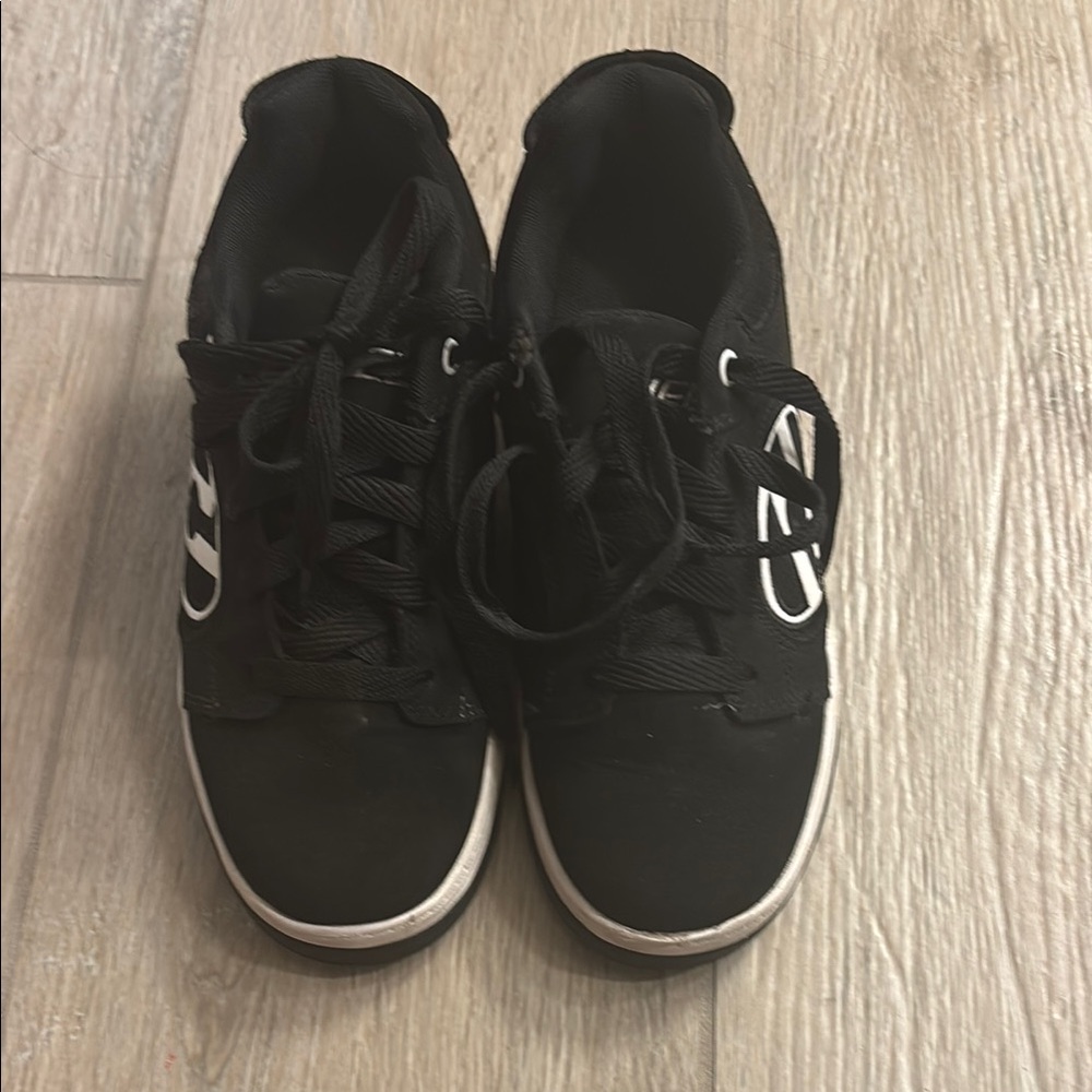 Black and White Heelys. Size 5